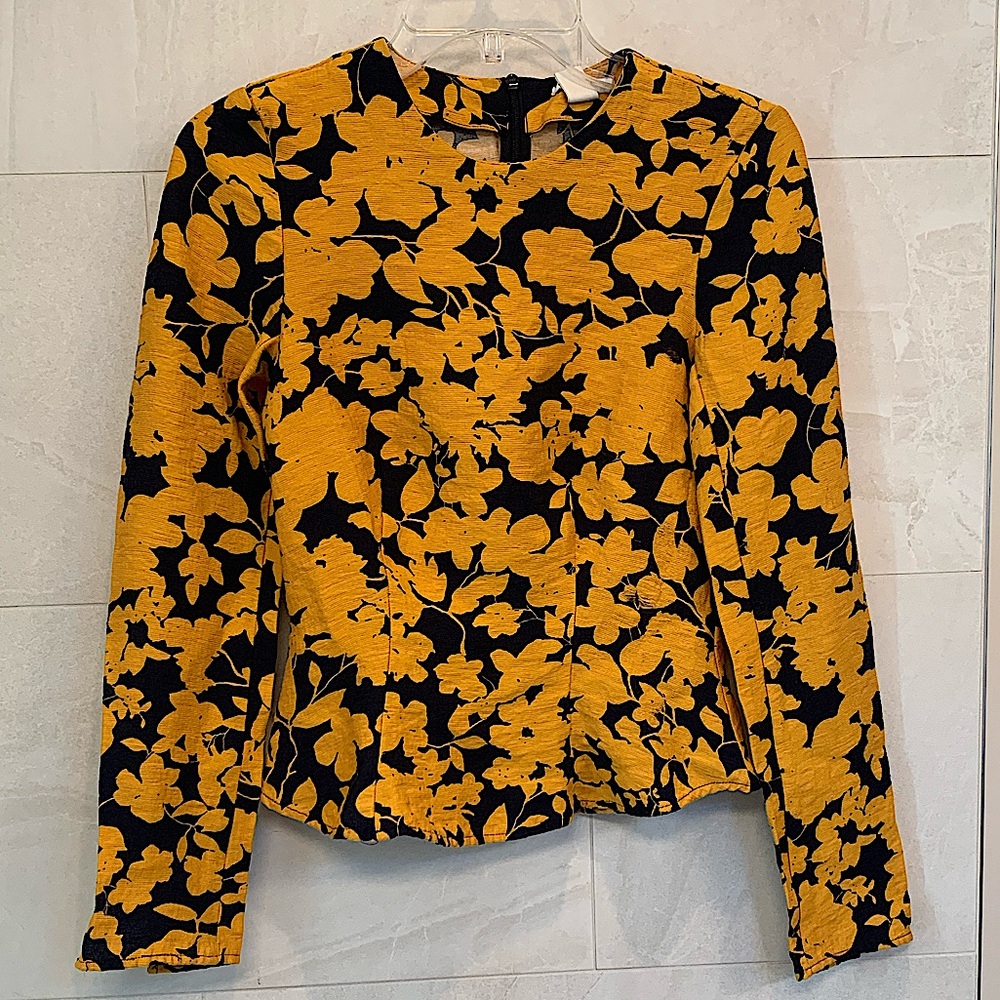 H&M fitted blouse size 4 with pleated detailing on torso